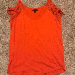 White and orange tops